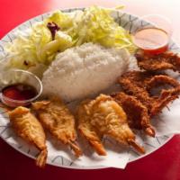 4 Piece Prawn Tempura · Straightened prawns lightly coated in traditional tempura batter.