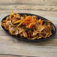38. Pad Kee Mao  · Stir-fried wide rice noodles, a choice of meat, onions, carrots, basil leaves, chili peppers...
