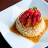 Flan Español · Luxurious baked custard with a rich caramel sauce.