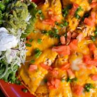 Mexican Pizza Dinner · Crips flour tortilla topped with choice of beans and choice of meat. Topped with Jack and Ch...