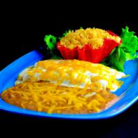Enchiladas a la Crema Dinner · Enchiladas smothered with a rich, decadent cream sauce and Cheddar cheese. Served with choic...