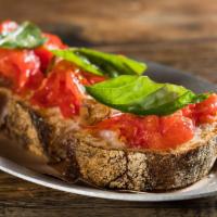 Bruschetta · rubbed garlic, sea salt, crushed fresh tomato, homemade toasted bread