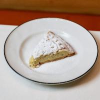 Ricotta Mascarpone Cheesecake · sugar dough base with fluffy cheese cake and hints of lemon, vanilla and orange