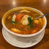 16. Thum Yum Bowl · Slightly sour and spicy soup with herbs, tomatoes and mushrooms. Mild. 
