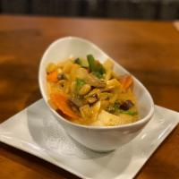 31. Kaeng Mussamun Curry ·  Mussamun sauce in coconut cream, whole roasted peanuts, potatoes and carrots. Mild. Gluten-...