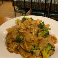 55. Pad See Ew · Pan-fried rice noodle with egg and broccoli, with your choice of meat.

