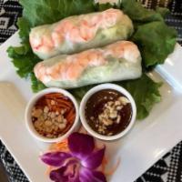 2. Thai Orchid Spring Rolls · 4 spring rolls prepared with chicken and shrimp, glass noodles and vegetables served with Th...