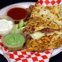 Quesadilla · Fresh flour tortilla sutffed with melted mix cheese, tomatoes and green onions. topped with ...