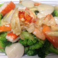 A3. Seafood Delight · Crabmeat, lobster, scallops and jumbo shrimp with Chinese vegetable in traditional white sau...