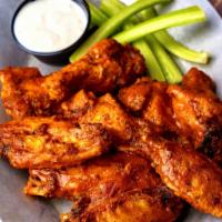 Ford's Classic Wings · Crispy chicken wings served with celery sticks, blue cheese, and choice of sauce: Buffalo, b...