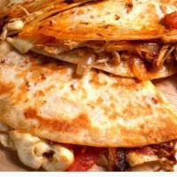Chipotle Quesadilla · Shredded chicken and chipotle sauce served with rice and beans.