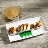 Spider Roll · Fried soft shell crab with avocado, cucumber and crabmeat.