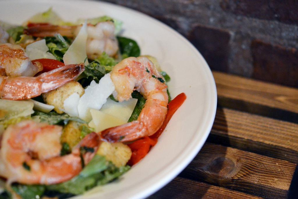 Shrimp Caesar Salad · Romaine lettuce, Parmesan cheese, croutons and Caesar dressing. 