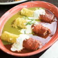 Enchiladas de Mole Poblano · three soft corn tortillas rolled with choice of stuffing and mole sauce topped with mexican ...