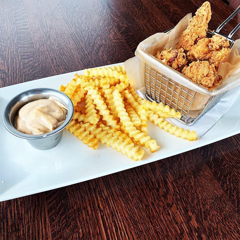 Chicken Tenders Appetizer · Buttermilk-fried chicken tenders with french fries and comeback sauce. The sauce is incredible, you’ll ask for more!