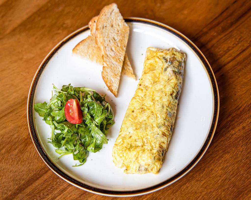 Seasonal Vegetable Omelet · Brussel sprouts, spinach, mix of yellow, green and pasilla peppers,
leeks, and fresh herbs, side of toast and grainy mustard arugula salad