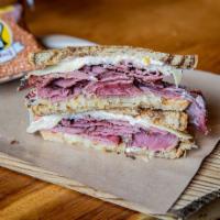 Pastrami Reuben · Boar's Head pastrami, sauerkraut, Swiss cheese, our thousand island dressing on a marble rye...