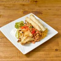 Chicken Fajita · All fajitas are served over a bed of sauteed green peppers and Spanish onions. Fresh flour t...