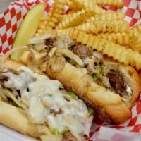 Mama D's Sub · Philly steak and grilled onions topped with melted mozzarella and homemade marinara. Served ...