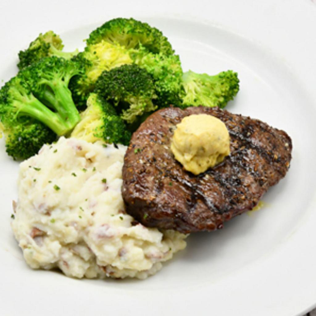 Top Sirloin · 8oz. USDA Choice Top Sirloin topped with garlic butter. Served with mashed potatoes and seasonal vegetables. This item can be prepared gluten free.