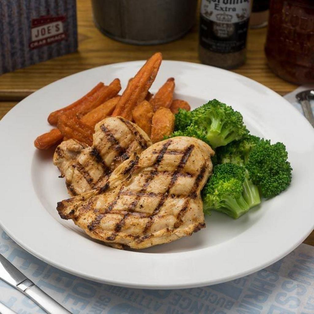 Herb Grilled Chicken Breast · Chicken breasts topped with herb butter. Served over mashed potatoes and seasonal vegetables. This item can be prepared gluten free.