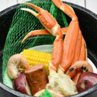 Kid's Steampot · Includes a cluster of snow crab, three shrimp, sausage, corn on the cob, and potatoes.