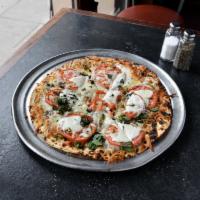 Margherita Pizza · Sliced ripped tomatoes and fresh basil topped with fresh mozzarella cheese. Choice of dressi...