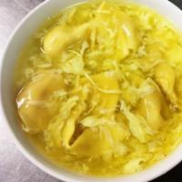 Wonton Egg Drop Mix Soup · Seasend broth with filled wonton dumplings.