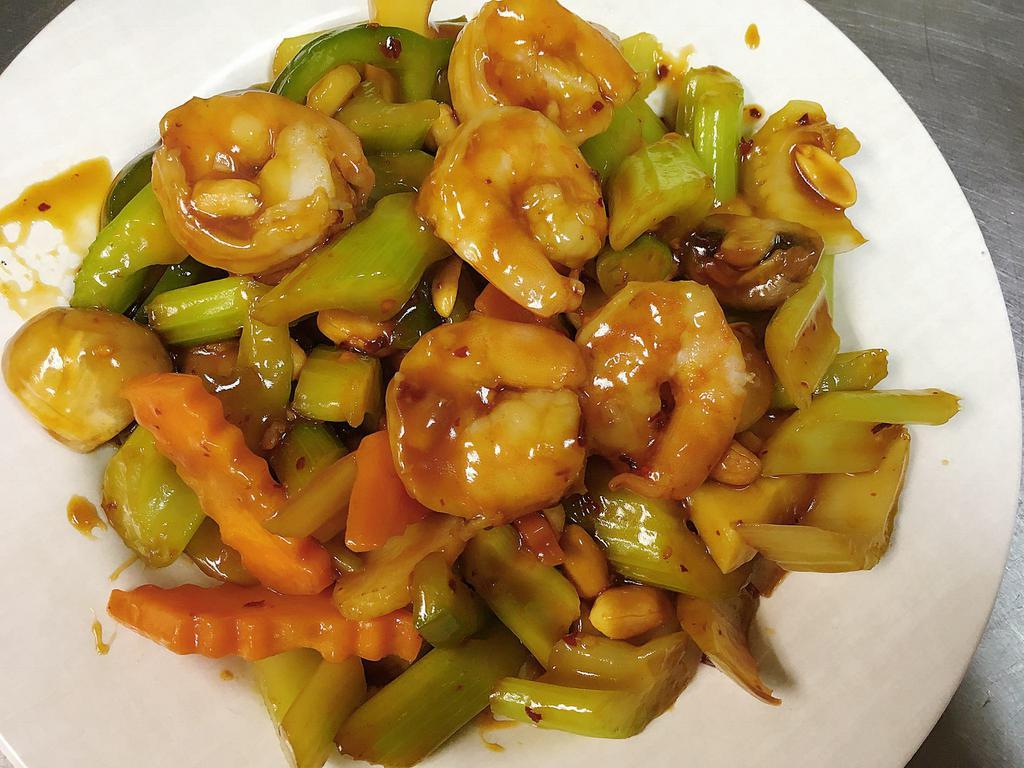 Kung Pao Shrimp · Famous little basil house spicy sauce sauteed with green peppers, carrots, celery, and topped with peanuts. Served with white rice. Hot and spicy. 