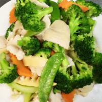 Steamed Chicken · With mixed vegetables.