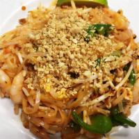 Pad Thai with Shrimp · Thai-style rice noodles topped with crushed peanut. Hot and spicy.