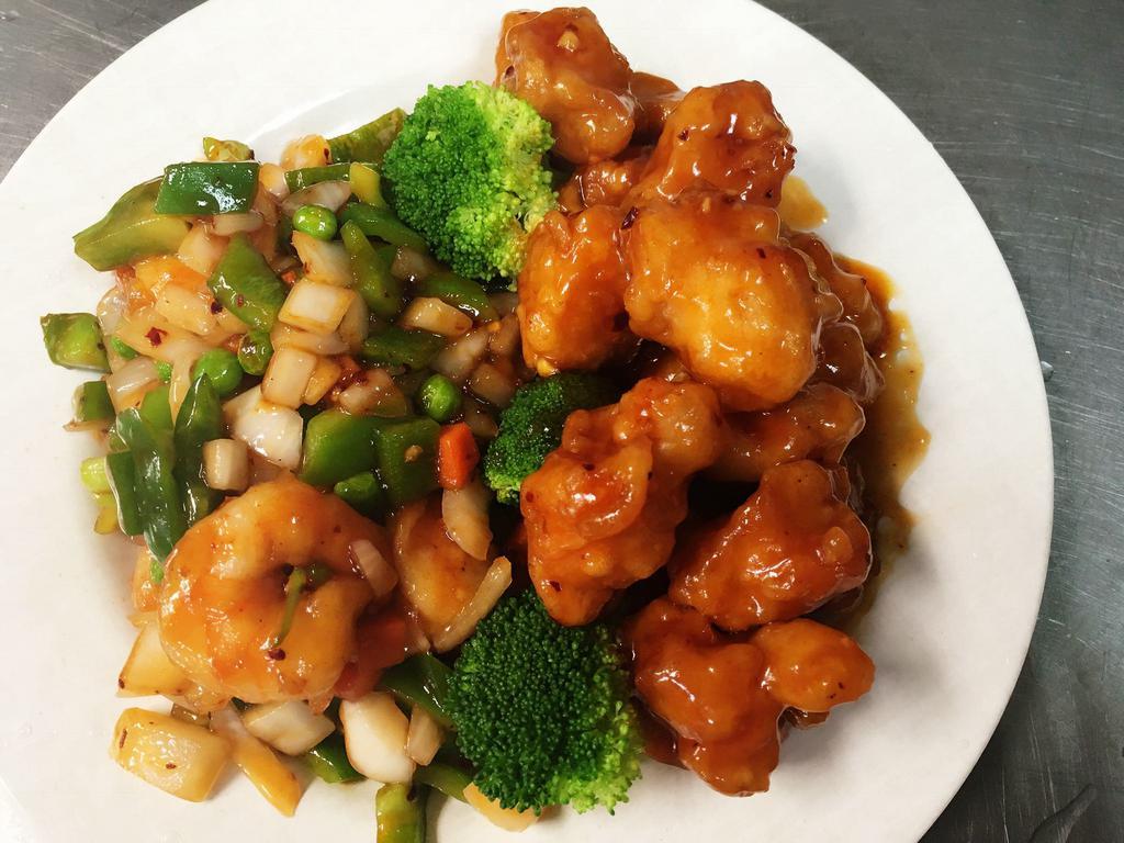 Dragon Meets Phoenix Special · 1/2 of general Tso's chicken and 1/2 of hot and spicy shrimp. Hot and spicy. 