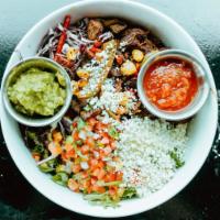 Southwestern Salad · Grilled fajita steak, sauteed peppers and onions, red cabbage, hominy, pico, Cotija, avocado...