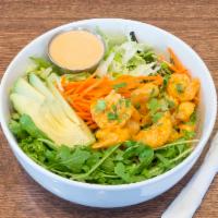 West Coast Salad · Corn starch fried shrimp, arugula, iceberg, green onion, cilantro, carrots, sliced avocado a...