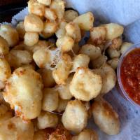 Battered Garlic Cheese Curds · House-battered Jisa Farmstead Garlic Cheddar Cheese Curds of Brainard, NE. Served with your ...