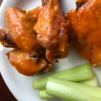 6 Wings · Jumbo wings drenched in your choice of wing sauce...Classic buffalo, Thai Peanut, Honey BBQ,...