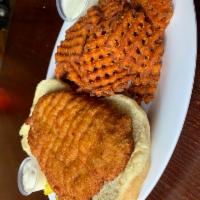 Pork Tenderloin Sandwich · hand-cut and freshly breaded, deep-fried to a golden brown and served on a Rotella's bun wit...