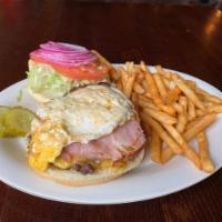 Barnyard Sandwich · Your choice of protein topped with shaved ham, a fried egg and a slice of American cheese. I...