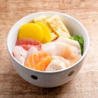Chirashi Bowl · Tuna, yellowtail, salmon, albacore, whitefish, egg, seaweed salad, pickles and blue crab wit...