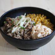Kalua Pig · Traditional Hawaiian smoked flavor pork slow oven-roasted for hours served with cabbage. Com...