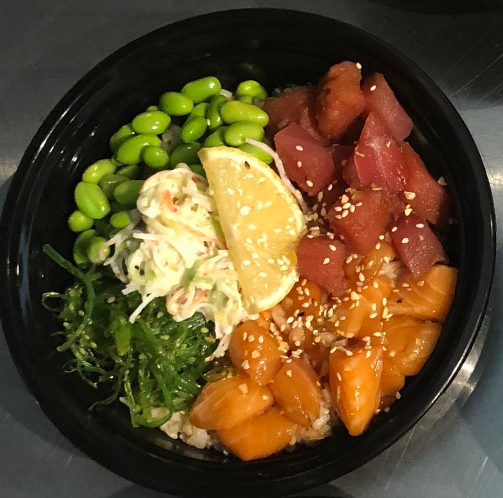 Ocean Bowl (Tuna & Salmon) · Premium sushi grade Tuna & Salmon marinated with seasoned with Hawaiian sea salt, shoyu, sesame oil and onion. Premium grade sushi rice. Comes with seaweed salad, edamame and crab salad.