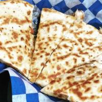 Cheese Quesadilla · Authentic Mexican style quesadilla folded over and grilled. Served with thin fries, salsa & ...