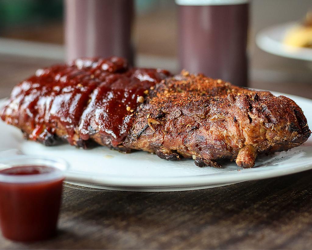 Whole Rack of Baby Jack Ribs · Served with 2 hot rolls.