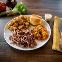 Large BBQ Plate Dinner · Choice of 1/2 lb. pork BBQ, smoked chicken, or beef brisket. Served with two sides, BBQ sauc...