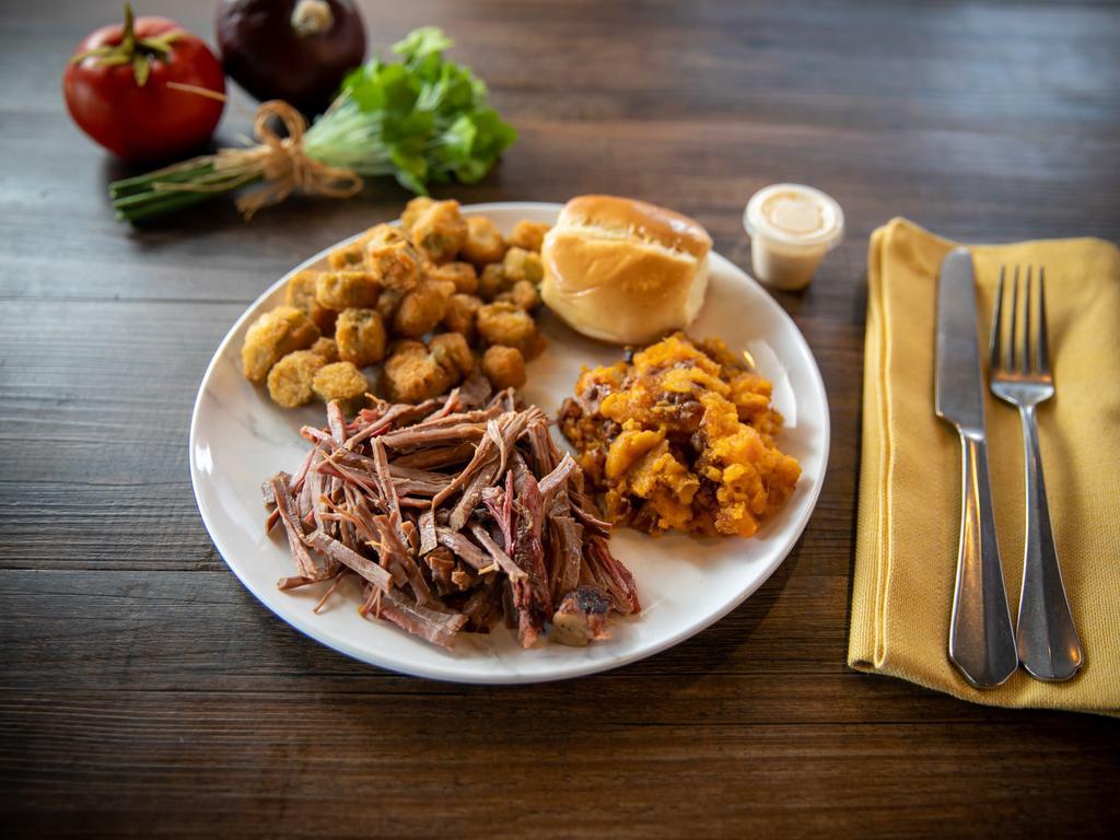Large BBQ Plate Dinner · Choice of 1/2 lb. pork BBQ, smoked chicken, or beef brisket. Served with two sides, BBQ sauce, hot roll, and a cold drink.