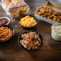 Family Pack #1 · Serves 3-4. Includes 1 lb. BBQ, 2 pints of sides, 8 pack of buns, 4 oz. cup BBQ sauce, gallo...