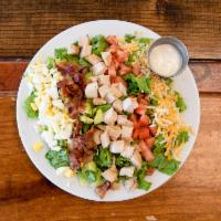 Cobb Salad · Lettuce, tomatoes, grilled chicken, avocado, bacon, shredded cheese, boiled eggs and choice ...