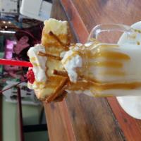 Caramel Milkshake · Comes with caramel sauce, cheesecake slice, pretzels, whipped cream and a cherry. (sauces an...