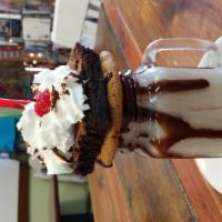 Chocolate Milkshake · Comes with chocolate chip cookie, brownie, chocolate sauce, whipped cream and a cherry. (sau...