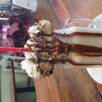 Peanut Butter Milkshake · Comes with chocolate peanut butter pie slice, chocolate sauce, whipped cream and a cherry. (...